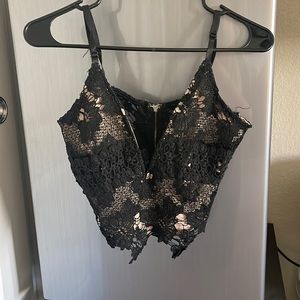 Cute dressy top for going out black with detailing tan inside